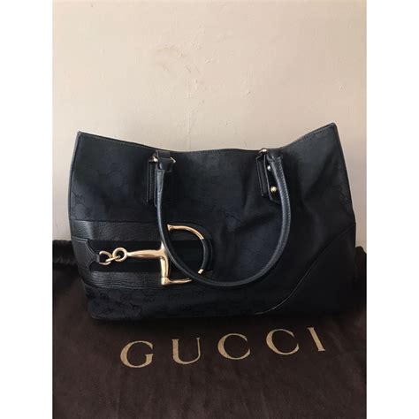 jual gucci.